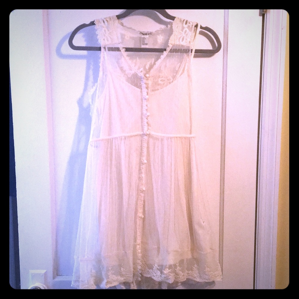 New with tags cream colored dress